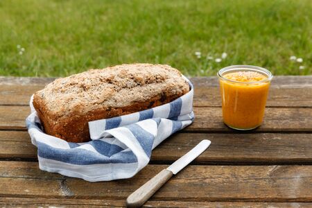 Picnic with self-baked wholemeal-wheat-spelt-bread and carrot spread