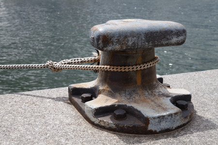 Harbour, bollard and ropeの写真素材