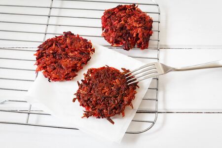 Bedroot hash browns on grid, veganの写真素材