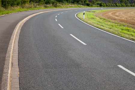 Germany, North Rhine-Westphalia, road, asphalt, curveの写真素材