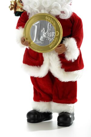 Father Christmas holding euro coinの写真素材
