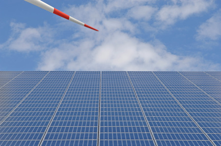 Germany, Baden-WÃ¼rttemberg, Merklingen, Solar panels and wind turbine on roofの写真素材