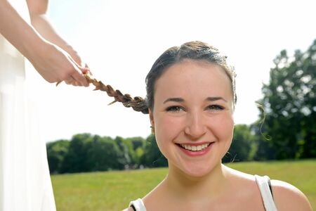 Girlfriends, braid, braiding, plaitの写真素材