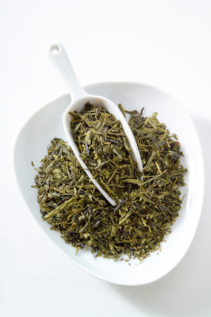 Japanese sencha tea, bowl, white backgroundの写真素材