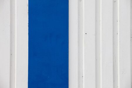 White and blue metal wallの写真素材