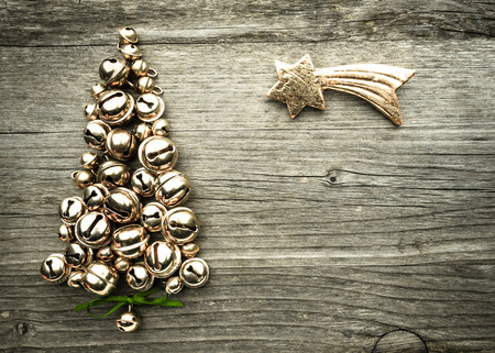 Bells, christmas tree on wood, comet, starの写真素材