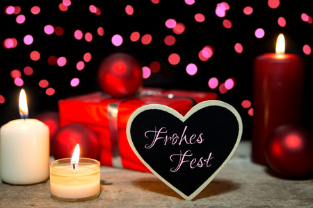 Christmas decoration, candles, baubles, wooden heart, Merry Christmasの写真素材