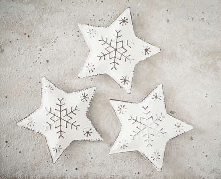 Christmas decoration, stars of metal on concreteの写真素材