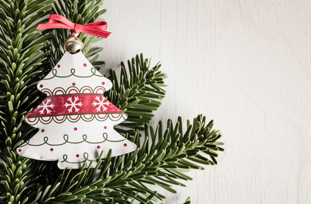 Christmas decoration, evergreens, white wood, christmas treeの写真素材