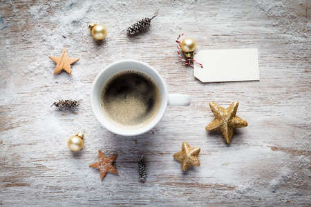 Christmas still life, cup of coffee, tagの写真素材