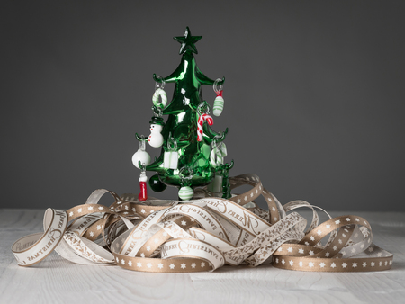 Christmas tree of glass, gift ribbonの写真素材