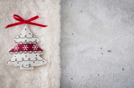 Christmas decoration, christmas tree on plush, concreteの写真素材