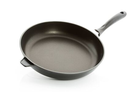 Aluminium fry pan isolated against white backgroundの写真素材