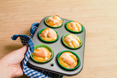 Home made Madeleine cookies in baking dishの写真素材