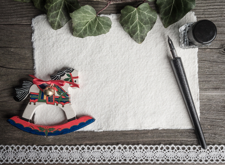 Christmas card, christmas decoration, rocking horse, quill and laceの写真素材
