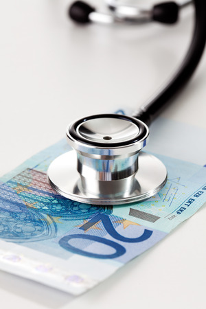 Euro notes and stethoscope, close upの写真素材