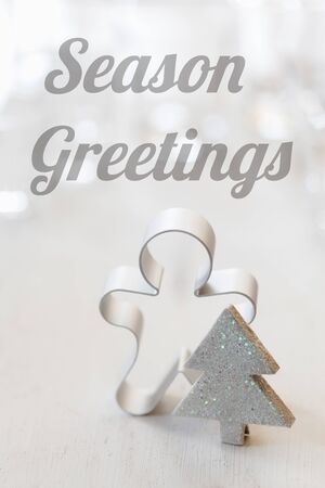 Christmas still life with biscuit cutter, English wishes, Season greetingsの写真素材