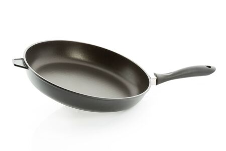 Aluminium fry pan isolated against white backgroundの写真素材