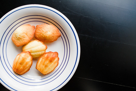 Home made Madeleine Cookies on plateの写真素材