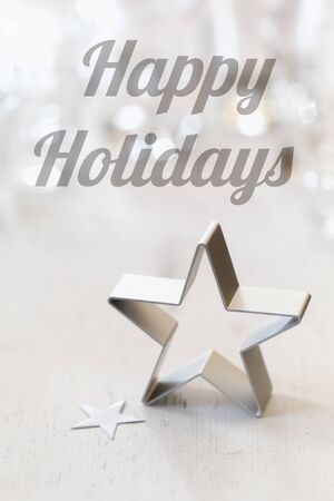 Christmas still life with biscuit cutter, English wishes, Happy Holidaysの写真素材