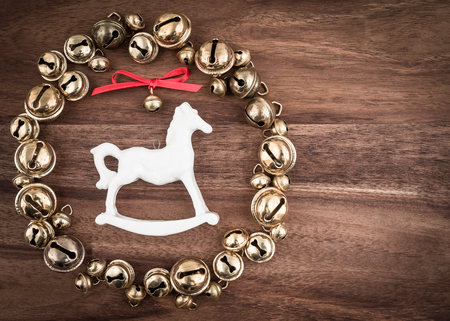 Christmas, bells on wood, christmas decorations, rocking horseの写真素材