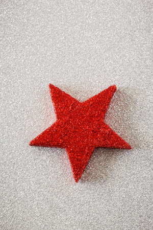 Red star on silver backgroundの写真素材
