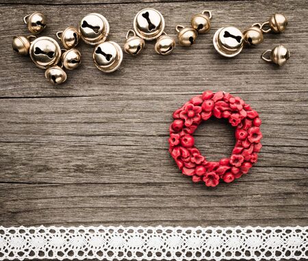 Bells, christmas decoration, wreath of wax, lace on woodの写真素材