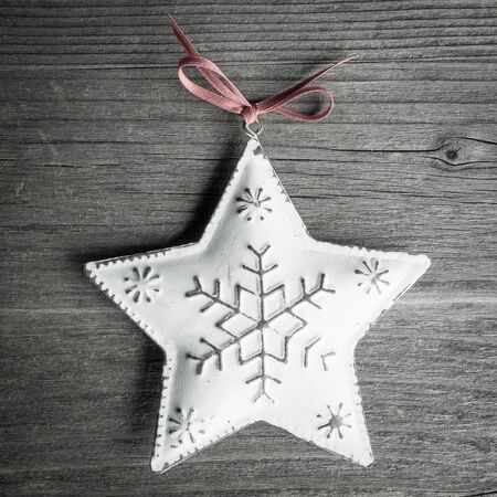 Christmas decoration, star on woodの写真素材