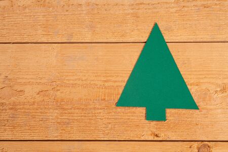 Fir tree on wood, copy spaceの写真素材