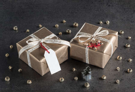 Christmas presents, gift tag, christmas decorations, angel and bellsの写真素材
