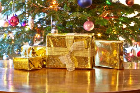 Golden christmas presents, Christmas treeの写真素材