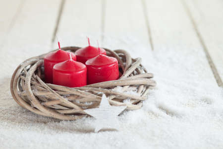 Wreath, red candles, wooden star, copy spaceの写真素材