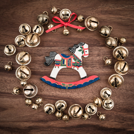 Christmas, bells on wood, christmas decorations, rocking horseの写真素材