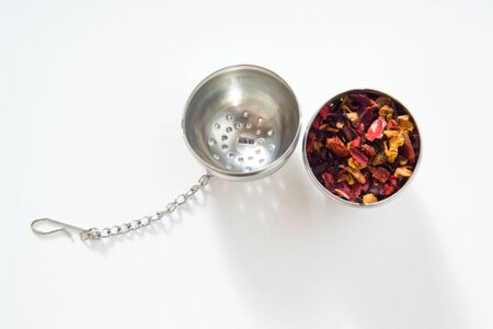 Tea strainer, fruit tea, white backgroundの写真素材