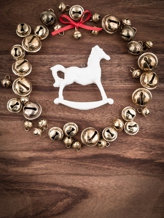 Christmas, bells on wood, christmas decorations, rocking horseの写真素材