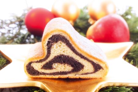 Stollen filled with poppy  seed, traditional German christmas confectionaryの写真素材