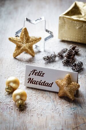 Christmas time, Still life with spanish wishes, sign, on woodの写真素材