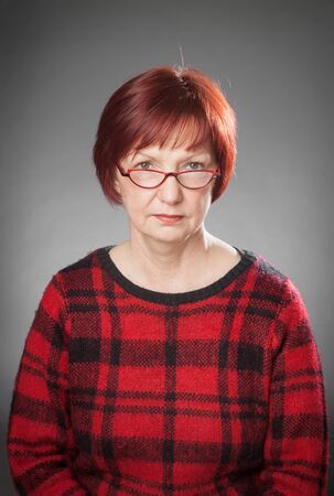 Red-haired woman, Portrait, Facial expression, seriousの写真素材