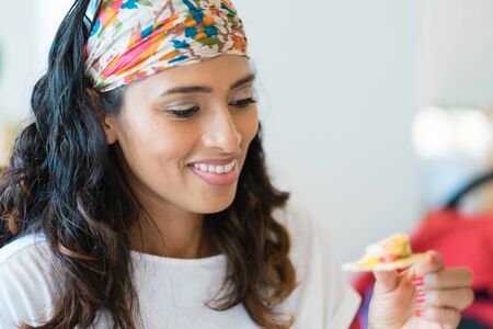Woman having cracker, snackの写真素材