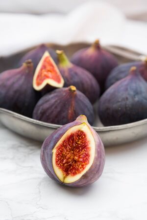 Figs in bowl, marbleの写真素材