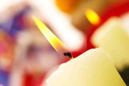 Lighted white candleの写真素材