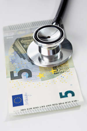 Euro notes and stethoscope, close upの写真素材