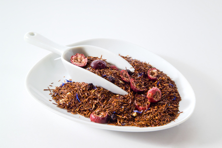 Roibush tea, tea blend with yogurt, blueberries, lingonberries and cornflowers, bowlの写真素材