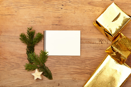 Christmas presents, notepad and ballbenの写真素材