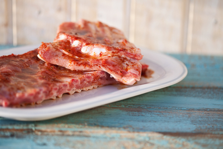 Close up of spare ribs of pork in plateの写真素材