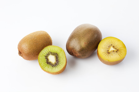 Kiwis, halved, white backgroundの写真素材