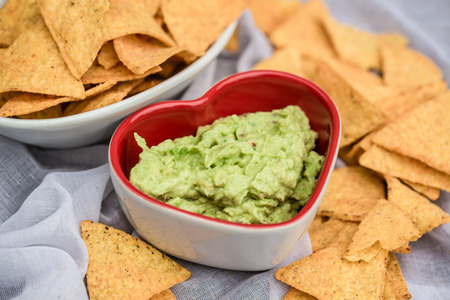 Taco chips with guacamoleの写真素材