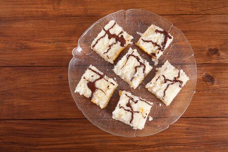 Sheet cake, coconut cake, chocolate icingの写真素材
