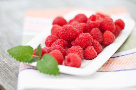 Germany,Close up of raspberry plate on napkinの写真素材