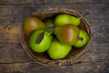Old pear sort Gute Luise in basketの写真素材